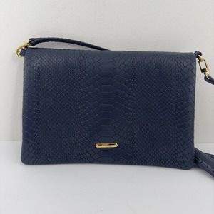 Gigi New York‎ blue leather Uber clutch